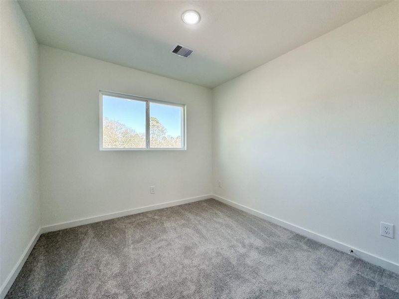 Spacious, unfurnished interior of a new home in , Conroe (Image 34).