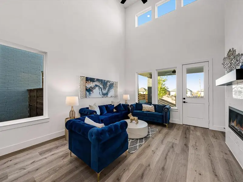 Furnished interior view inside a new home in Royal Court, Little Elm (Image 8).