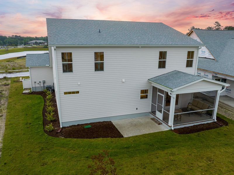 Representative exterior photo of a completed home built from the Willowbrook by Bill Clark Homes in Riverside Cove, Wilmington, NC (Image 25). Representative exterior photo of a completed home built from the Willowbrook by Bill Clark Homes in Riverside Cove, Wilmington, NC (Image 25).