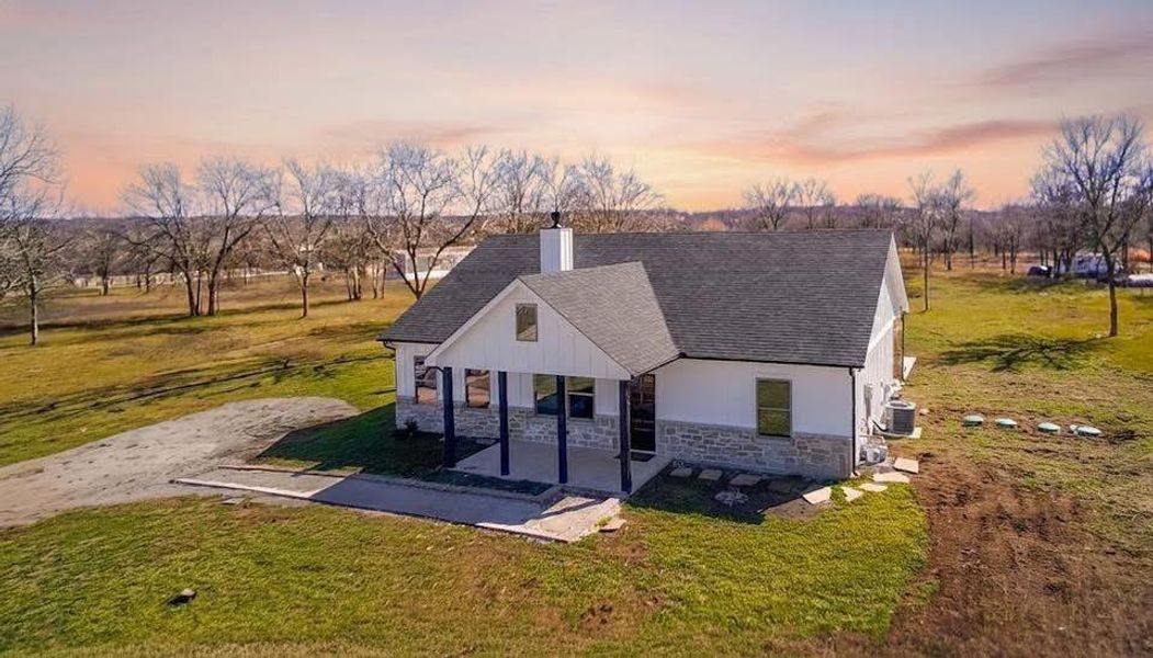 Front exterior of a new home in , Wortham, TX, highlighting curb appeal (Image 1). Front exterior of a new home in , Wortham, TX, highlighting curb appeal (Image 1).