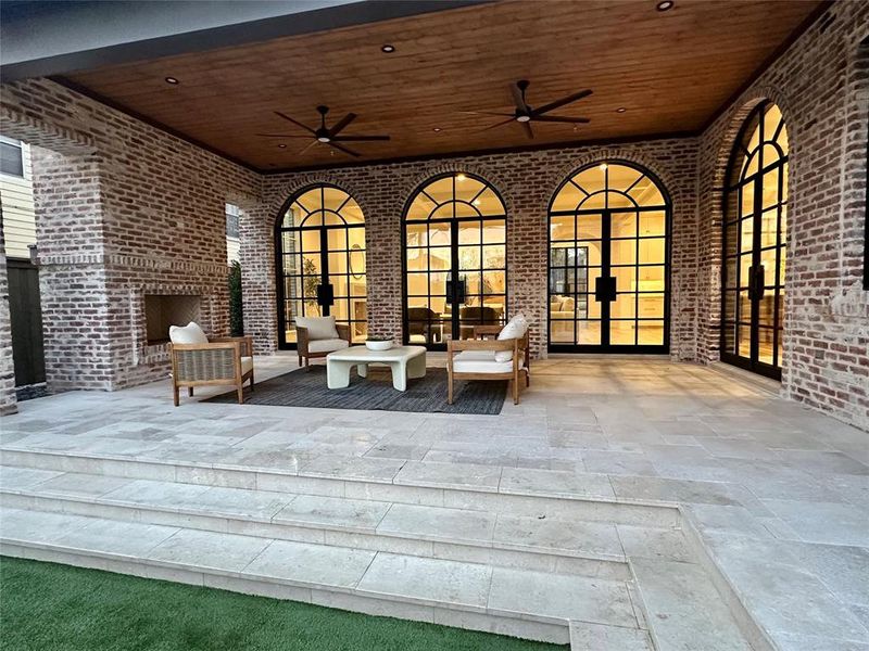 Outdoor living area with platinum ice marble floor and isokern fireplace