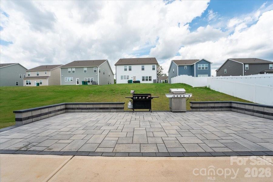 Exterior details and patio area of a home in , Oakboro (Image 29).