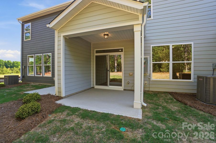 Exterior details and patio area of a home in Blythe Mill Townhomes, Waxhaw (Image 23). Exterior details and patio area of a home in Blythe Mill Townhomes, Waxhaw (Image 23).