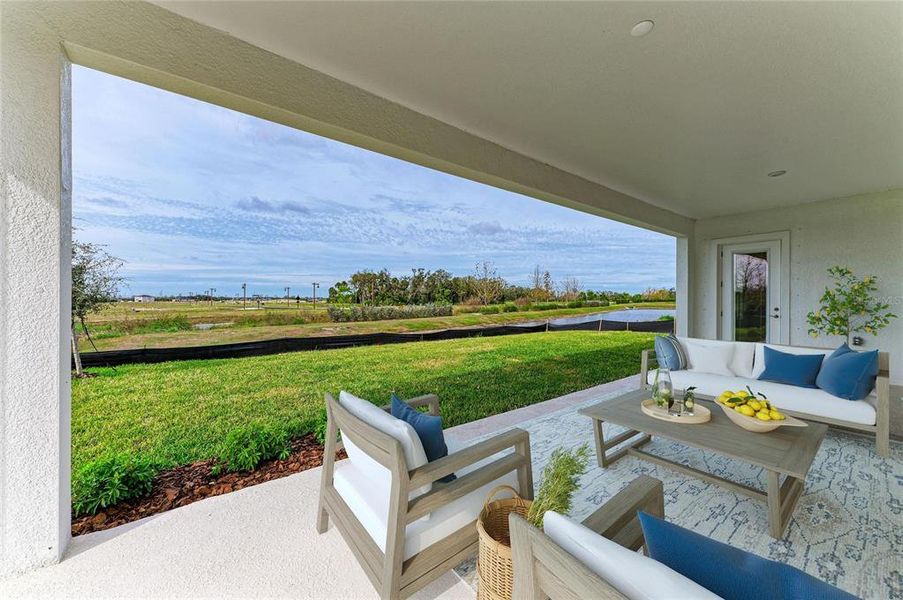 Exterior details and patio area of a home in North River Ranch, Parrish (Image 3).