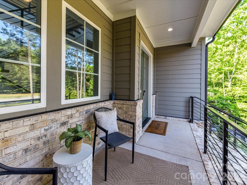 Welcoming, Covered Front Porch warmly greets you upon arrival. Welcoming, Covered Front Porch warmly greets you upon arrival.