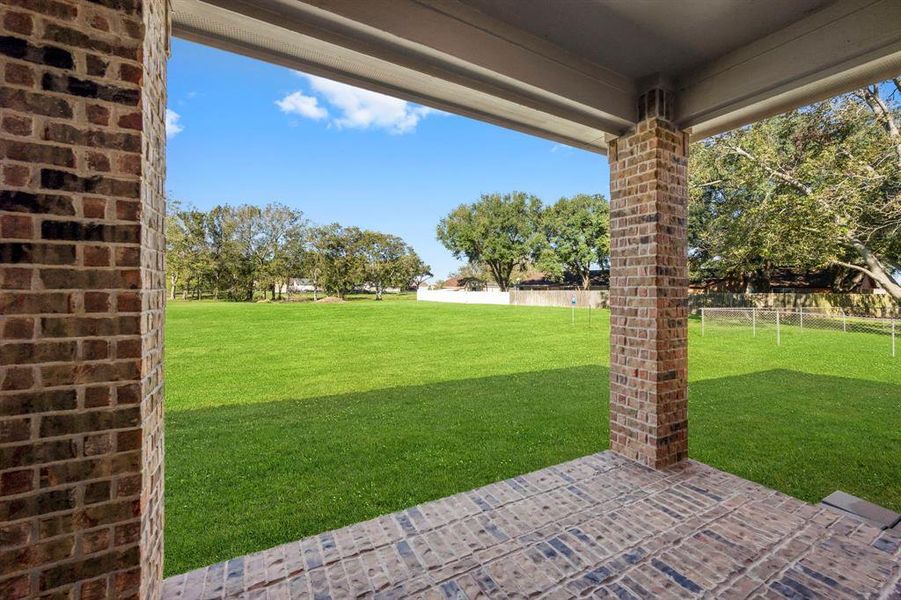 The large covered patio is the perfect place to relax and enjoy that morning cup of coffee or unwind at the end of a long day. No backyard neighbors! Dine alfresco and take in the unobstructed views of those Texas starts at night. This is country living at its finest!