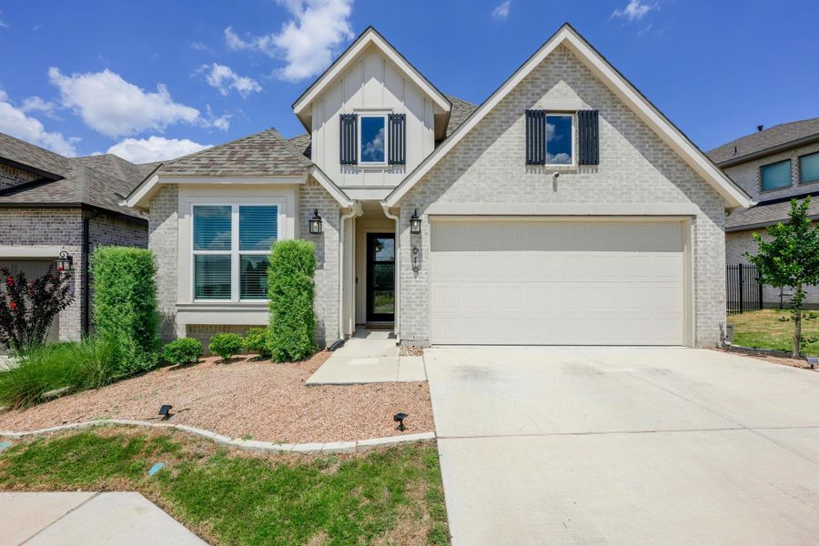 Front exterior of a new home in , Kyle, TX, highlighting curb appeal (Image 24).