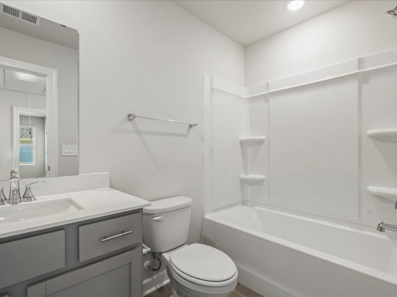 Furnished interior view inside a new home in The Farm at Wells Creek - Heritage Collection, Gray Court (Image 10).