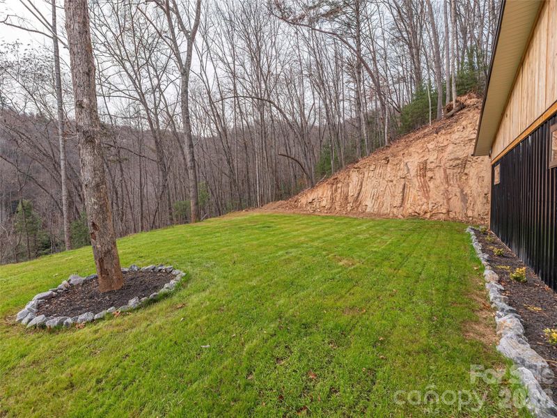 Exterior details and patio area of a home in , Waynesville (Image 25).