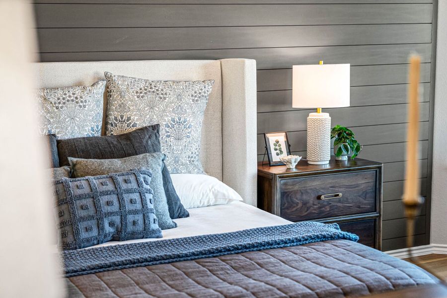 Primary bedroom in the model home located in Carillon at 13305 Eppright Trace Blvd., Manor, TX Primary bedroom in the model home located in Carillon at 13305 Eppright Trace Blvd., Manor, TX