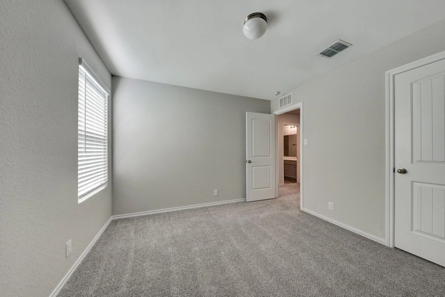 Representative unfurnished interior of a home built from the Devon by Ashton Woods in Cordova Trails, Seguin (Image 24).