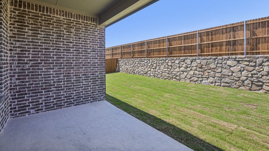 Exterior details and patio area of a home in Morning Ridge, Princeton (Image 2). Exterior details and patio area of a home in Morning Ridge, Princeton (Image 2).
