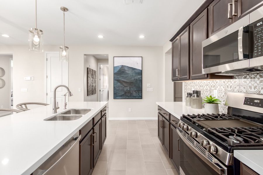 Representative furnished interior of a home built from the 40R1 by Taylor Morrison in Rancho Mercado, Surprise (Image 16).