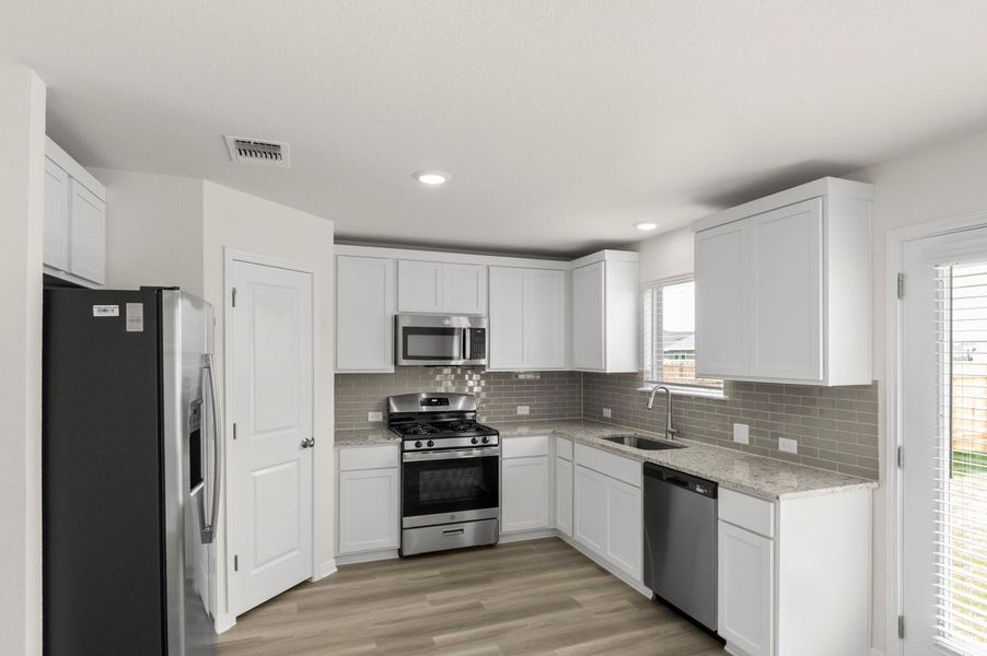 Furnished interior view inside a new home in Blanco Vista, San Marcos (Image 8). Furnished interior view inside a new home in Blanco Vista, San Marcos (Image 8).