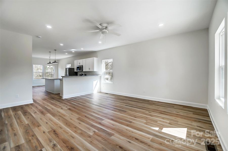 Open Floorplan of Living Room leading to the Kitchen