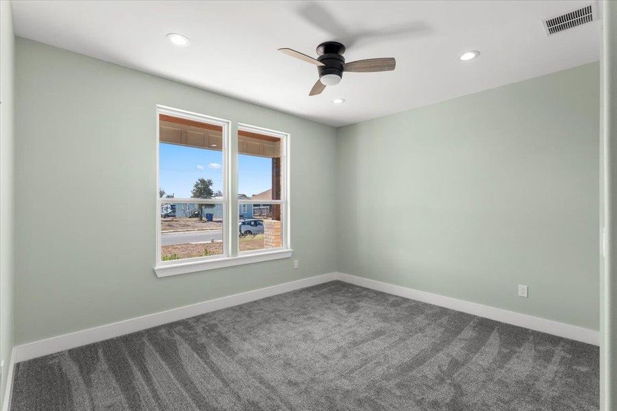 Bedroom number 1 featuring carpet flooring, recessed lighting, and a ceiling fan