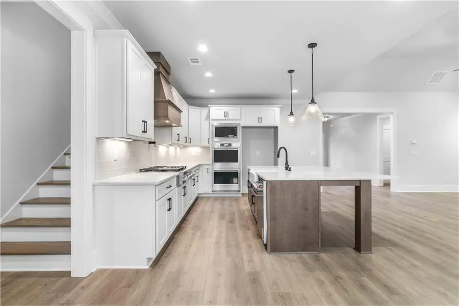 Furnished interior view inside a new home in Stonegate, Monroe (Image 10).