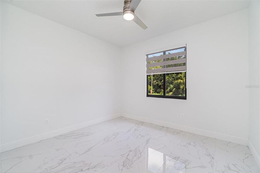 Spacious, unfurnished interior of a new home in , Port Charlotte (Image 16).