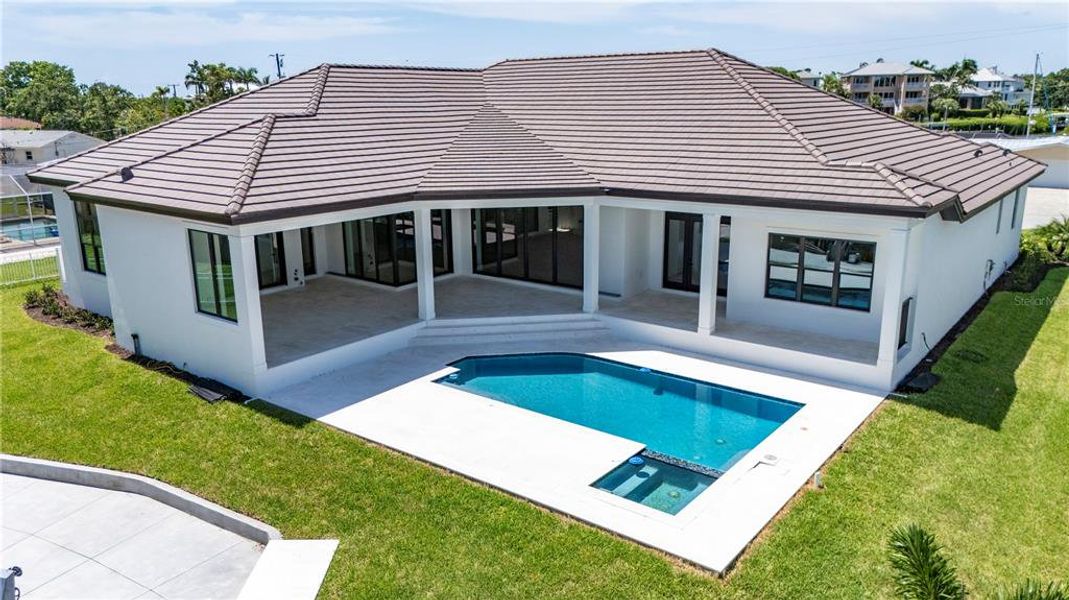 Front exterior of a new home in , Sarasota, FL, highlighting curb appeal (Image 17).
