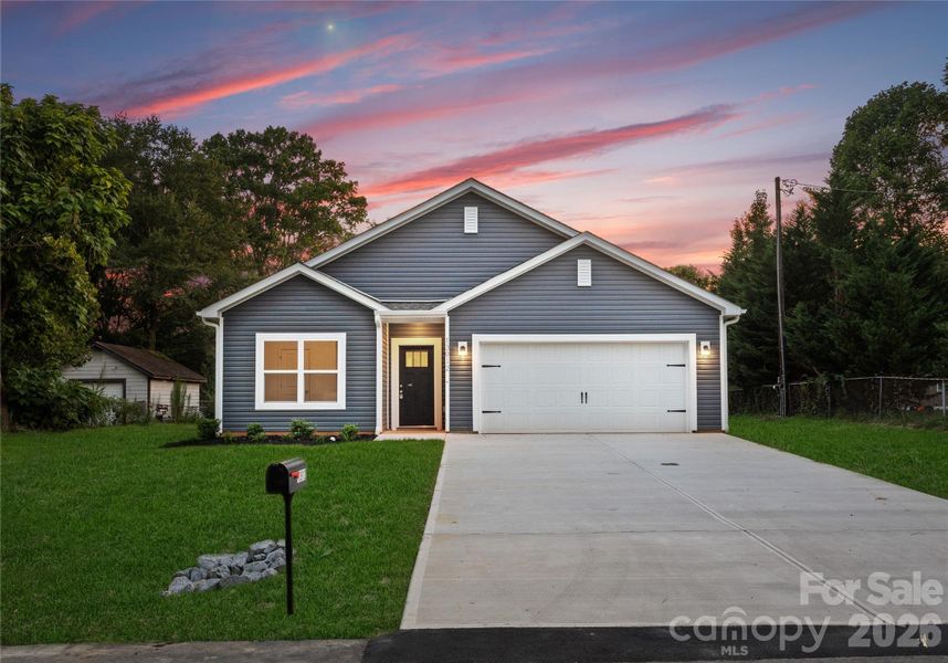 Front exterior of a new home in , Hickory, NC, highlighting curb appeal (Image 20).