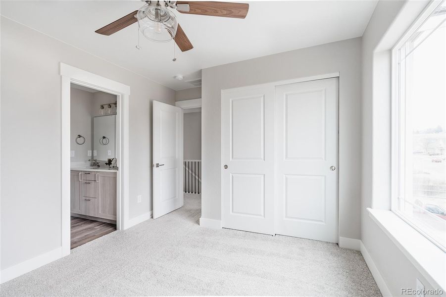 bedroom two with adjoining full, luxury finished bath