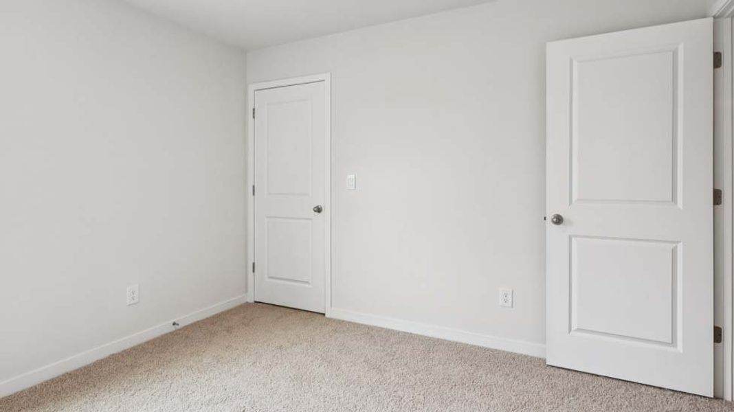 Spacious, unfurnished interior of a new home in Reedy Creek Preserve, Charlotte (Image 26).