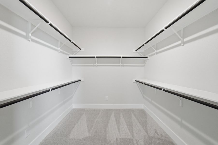 Spacious, unfurnished interior of a new home in The Woodlands at Medina Hills, Mico (Image 27).