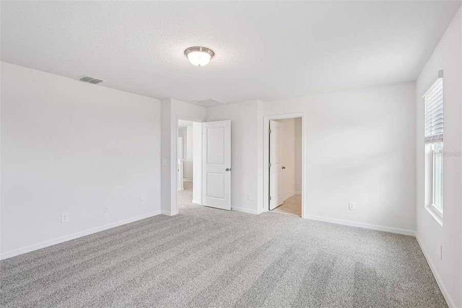 Spacious, unfurnished interior of a new home in Crosswinds - Signature Series, Haines City (Image 25).