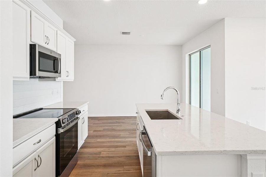 Furnished interior view inside a new home in Isla Mirada, San Antonio (Image 15).
