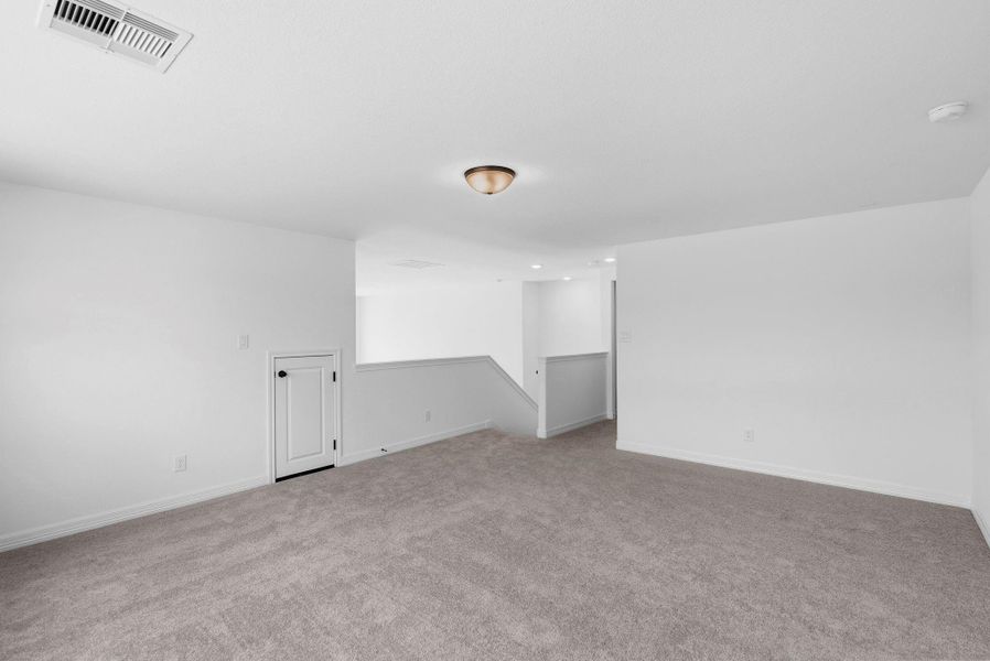 Spacious, unfurnished interior of a new home in Spring Creek Trails, Magnolia (Image 31).