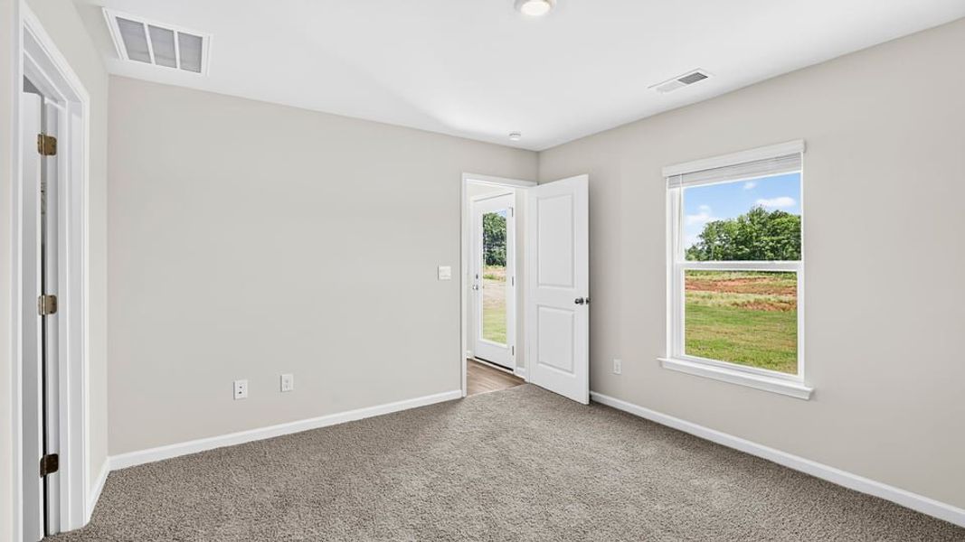 Spacious, unfurnished interior of a new home in Gibson Grove, Laurens (Image 29).