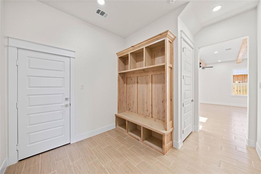 Mudroom featuring recessed lighting and wood finish floors Mudroom featuring recessed lighting and wood finish floors