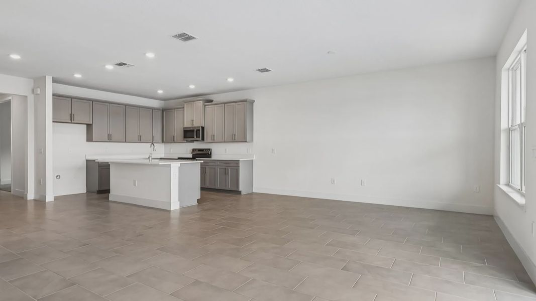 Furnished interior view inside a new home in Ardisia Park, New Smyrna Beach (Image 6).