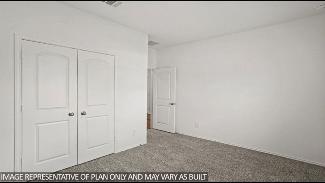 Representative unfurnished interior of a home built from the Midland by D.R. Horton in Sunterra, Katy (Image 15).