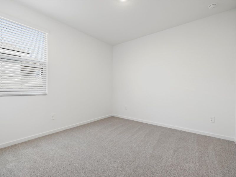 Spacious, unfurnished interior of a new home in Rancho Mirage Estate Series, Maricopa (Image 15).