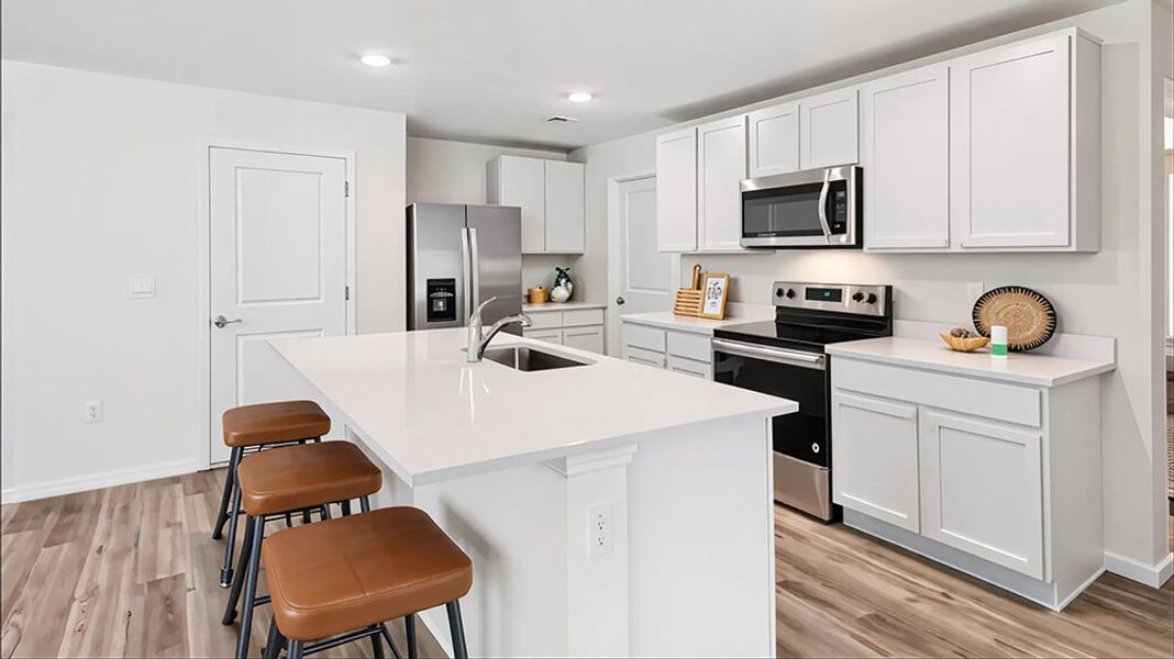 Representative furnished interior of a home built from the ROBIE by D.R. Horton in Oaks Preserve, Gainesville (Image 5).
