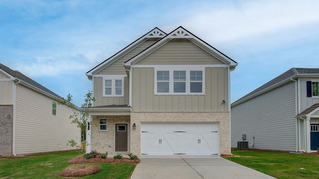 Representative exterior photo of a completed home built from the Zoey II by DRB Homes in Enclave at Evergreen, Fairburn, GA (Image 22).