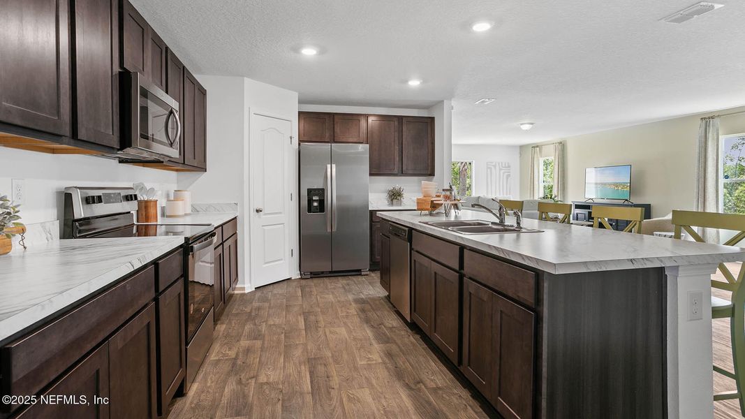 Furnished interior view inside a new home in Sawmill Branch Express, Palm Coast (Image 38). Furnished interior view inside a new home in Sawmill Branch Express, Palm Coast (Image 38).
