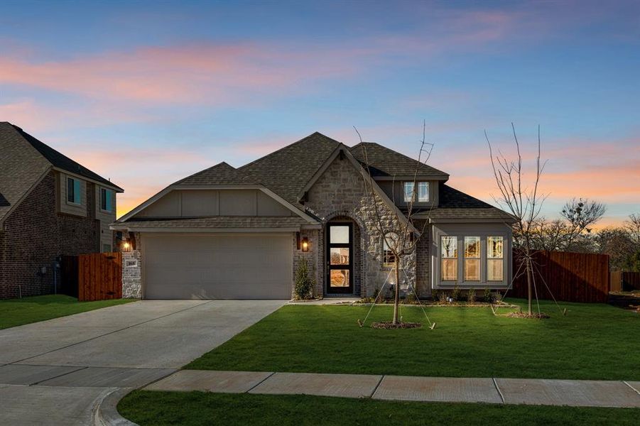 Front exterior of a new home in El Dorado, Granbury, TX, highlighting curb appeal (Image 2).