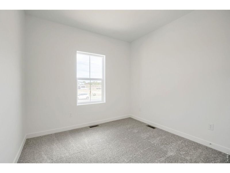 Spacious, unfurnished interior of a new home in Prairie Song, Windsor (Image 11).