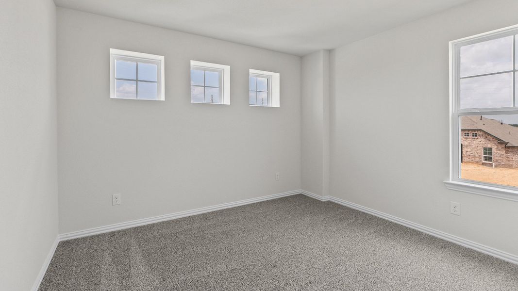 Representative furnished interior of a home built from the Southfork by Brightland Homes in Sunterra, Katy (Image 14).