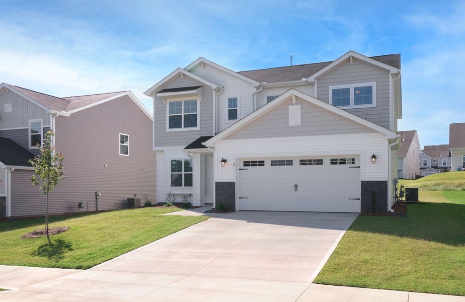 Representative exterior photo of a completed home built from the The Calle by Cothran Homes in Holly Ridge, Greenville, SC (Image 22). Representative exterior photo of a completed home built from the The Calle by Cothran Homes in Holly Ridge, Greenville, SC (Image 22).