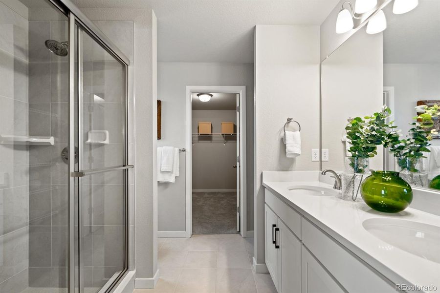 Photos shown are of a previously built model home and are intended to represent the floor plan. The home currently available may include different finishes, features, and selections.