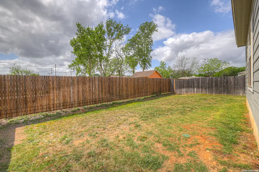 Exterior details and patio area of a home in Meadows of Martindale, Seguin (Image 4).