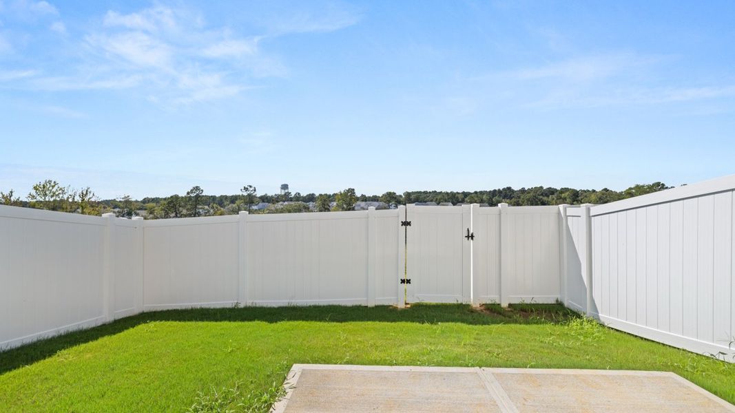 Exterior details and patio area of a home in Rushing Waters Townhomes, North Augusta (Image 3). Exterior details and patio area of a home in Rushing Waters Townhomes, North Augusta (Image 3).
