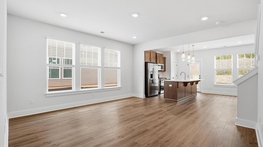 Exceptional family space with hardwood floors and seamless flow to dining and kitchen areas located in Greenville, SC Exceptional family space with hardwood floors and seamless flow to dining and kitchen areas located in Greenville, SC