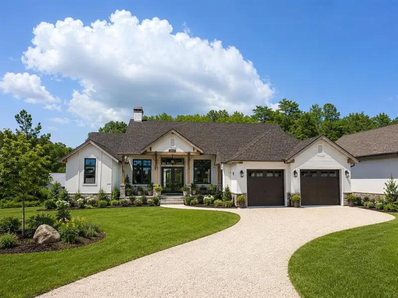 Front exterior of a new home in , New Port Richey, FL, highlighting curb appeal (Image 4). Front exterior of a new home in , New Port Richey, FL, highlighting curb appeal (Image 4).