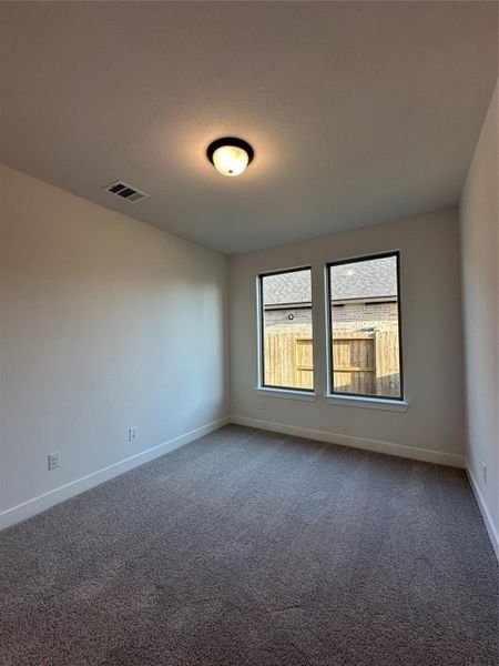Spacious, unfurnished interior of a new home in Cross Creek West, Fulshear (Image 35).