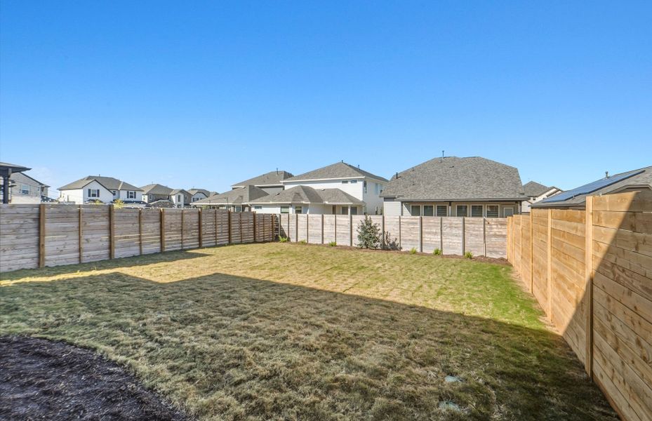 Exterior details and patio area of a home in Horizon Lake, Leander (Image 24).