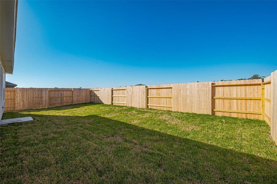 Front exterior of a new home in Tavola: Cottage Collection, New Caney, TX, highlighting curb appeal (Image 1).